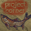 a link to the project corner, still under construction. A square image of a cave drawing of a fish. the text 'Project Corner' is written over it